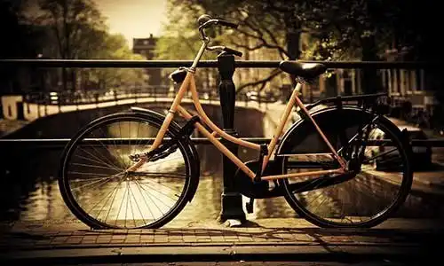 © Photocreo Bednarek - Fotolia | Amsterdam. Romantic canal bridge, bike