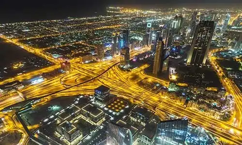 © Sergii Figurnyi - Fotolia | Dubai downtown night scene with city lights,