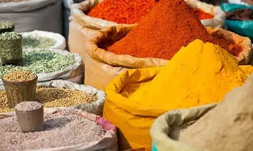 © Mariusz Prusaczyk - Fotolia | Indian colored spices at local market.