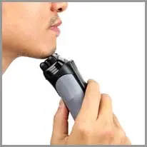 la máquina de afeitar eléctrica